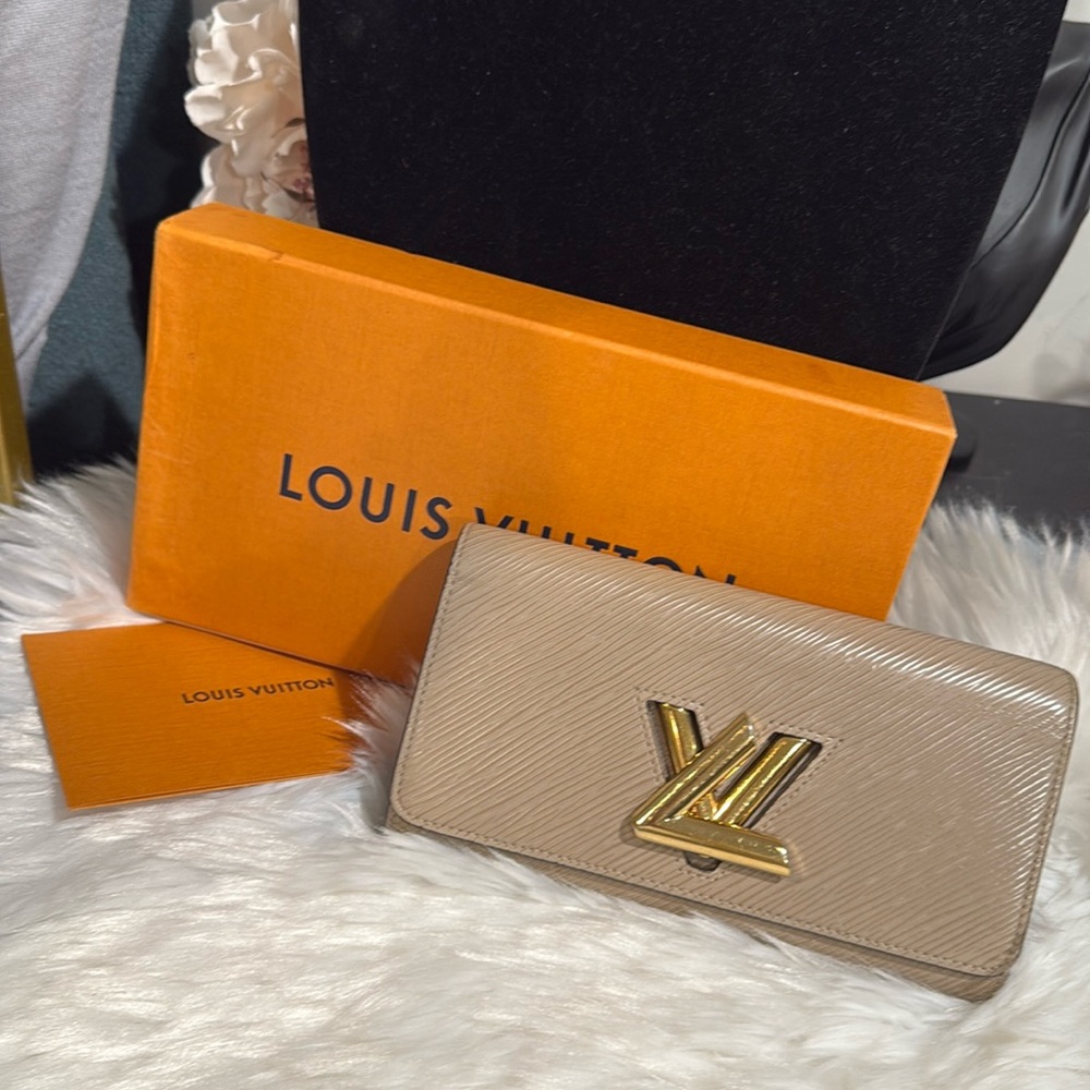 Louis Vuitton Beige Wallet with Gold Logo
